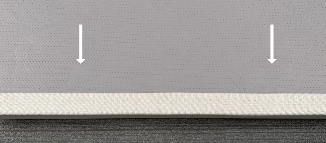 Arrows pointing to the retainer bar hole location on an adjustable base platform.