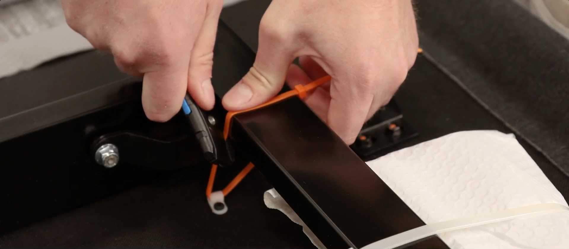 Step 3: Cut the orange zip ties