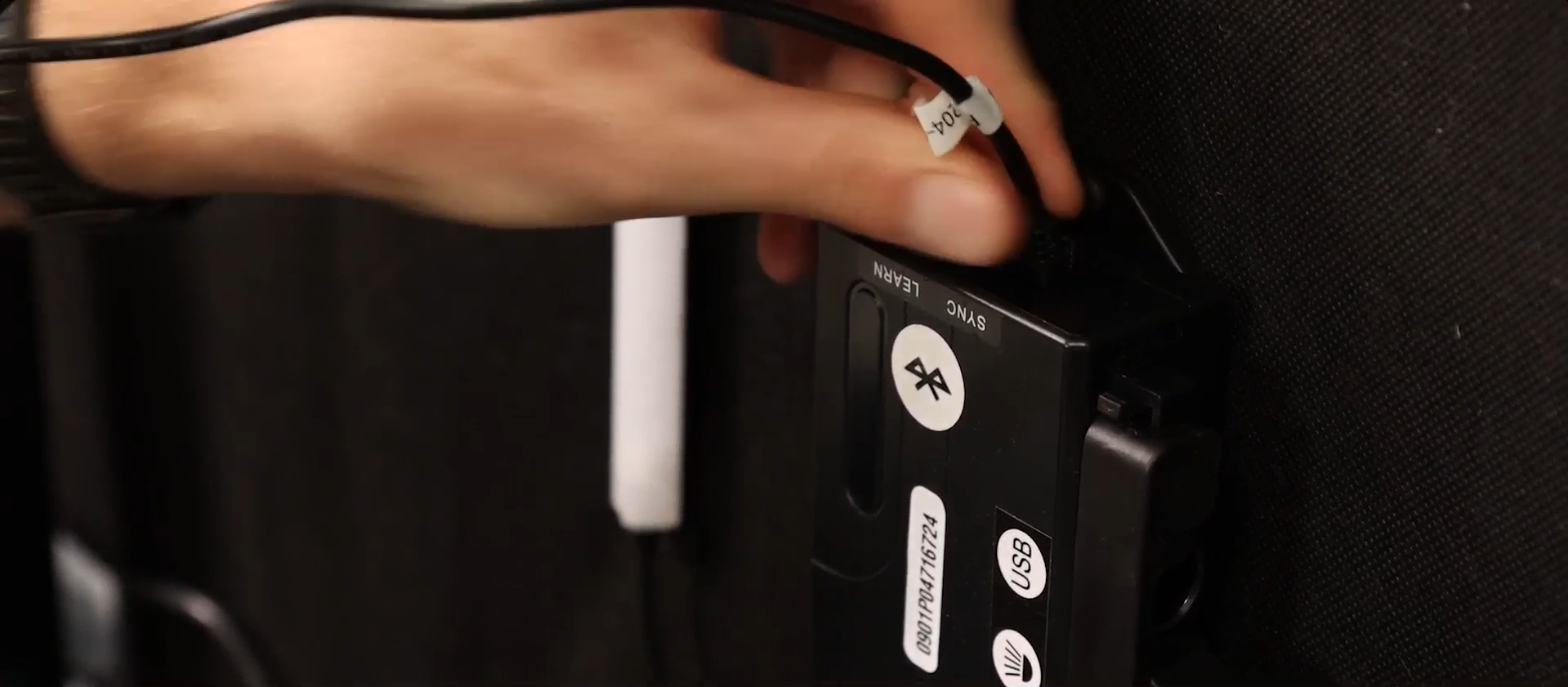 For King or California King bases, route the sync cable through the base openings and connect it to both control boxes