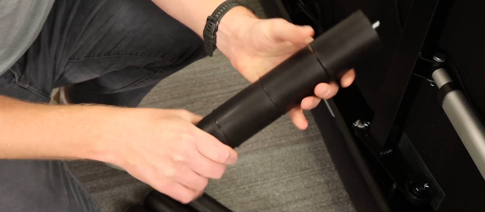 Assembling the legs of the base by connecting segments.