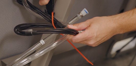 Cut and remove the orange zip ties.