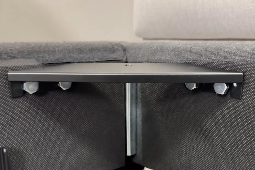 Install a corner bracket (included) at all 4 corners by sliding bracket down onto screws.