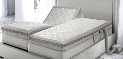 A DualTemp layer with the hose coming out at the head of the bed.