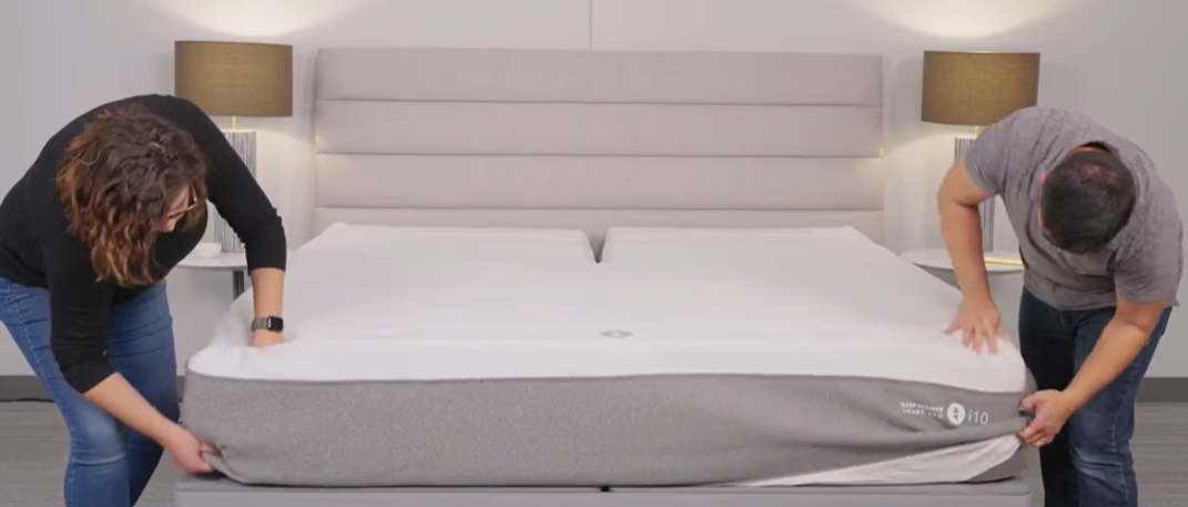 roll cover up, starting at the foot of the bed, exposing the foam
