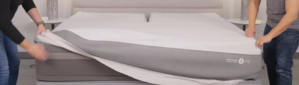 Roll cover back over mattress, align cover corners with foam comfort system corners.